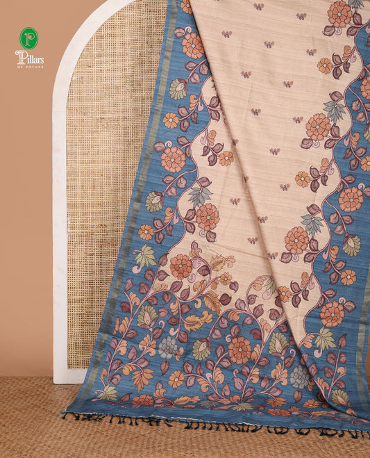Cream floral motif printed katan silk saree, contrast blue-color border & pallu of kalamkari-style floral vine print