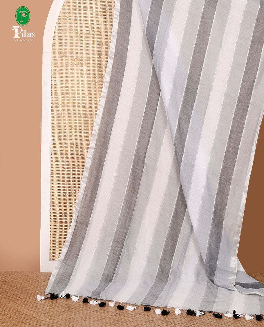 Grey-shaded striped khadi cotton saree, zari piping border, multi-color tassels pallu & colorful striped blouse