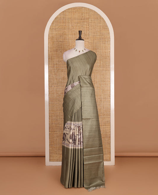 Borderless Green dobby style buttas and animal motifs printed semi tussar saree, contrast digital printed blouse