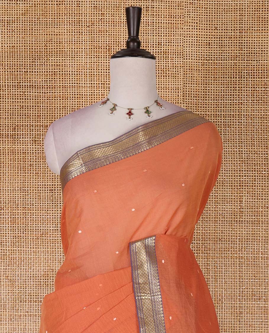 Rust buttas Mangalagiri cotton saree, contrast traditional zari border, floral vine with bird embroidered pallu, and matching blouse