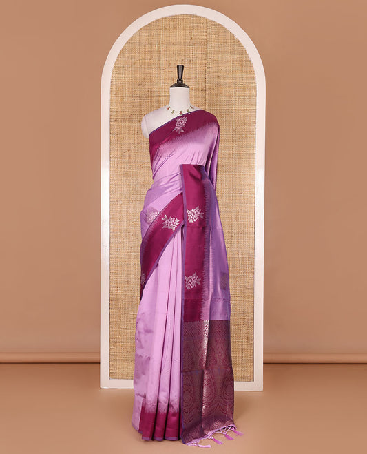 Lavender-purple floral buttas elite soft silk saree, contrast floral buttas border, and pallu of Mughal-style intricate zari designs