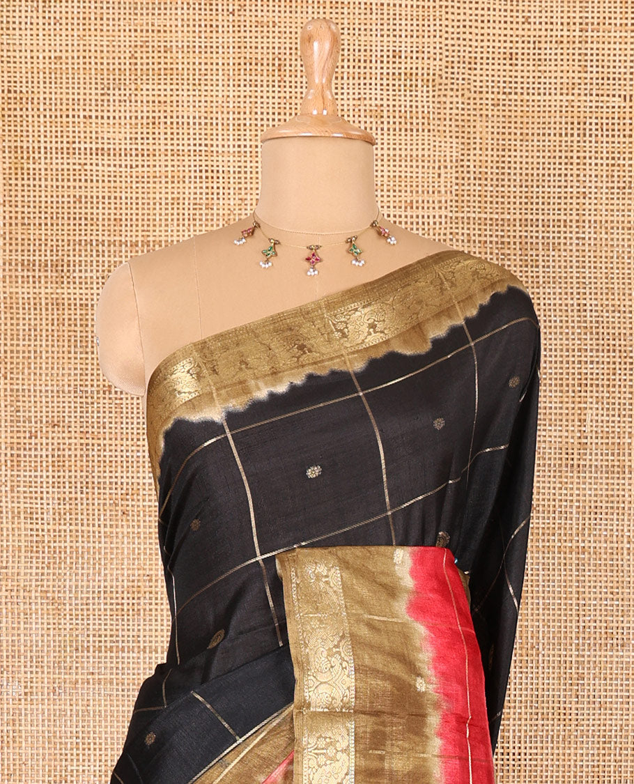 Black buttas enclosed checked dola silk saree, contrast shibori print with traditional zari border, buttas enclosed checked pallu, and a contrast buttas enclosed checked blouse