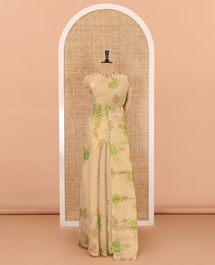 Gold and green rose motifs printed with mirror work tissue saree, scallop embroidered border, printed pallu, and a contrast blouse