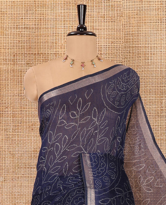 Navy blue bandhani-style floral and chakra printed saree, zari piping border, contrast ajrakh printed pallu, and contrast ajrakh printed blouse