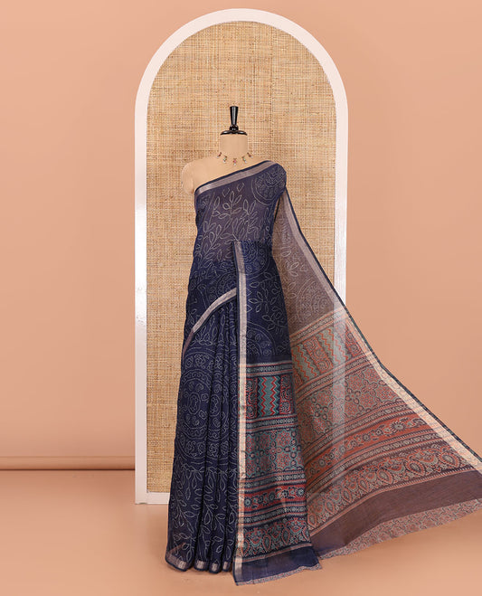 Navy blue bandhani-style floral and chakra printed saree, zari piping border, contrast ajrakh printed pallu, and contrast ajrakh printed blouse