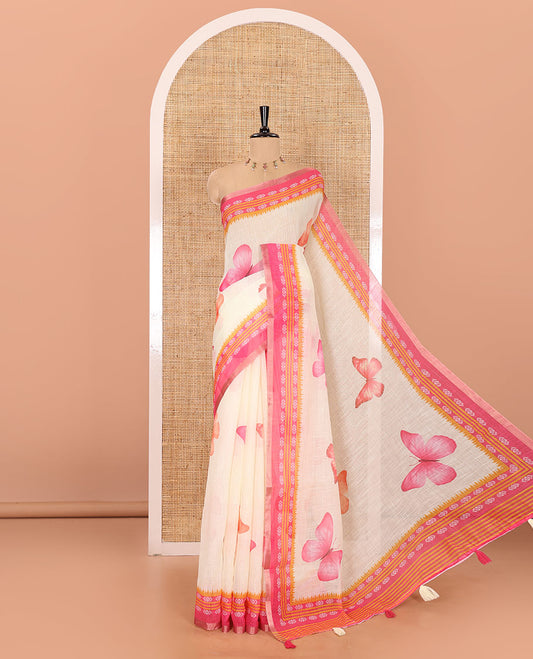 Peach and rani pink color butterfly motifs printed linen-cotton saree with contrast geometric-printed border and a printed blouse