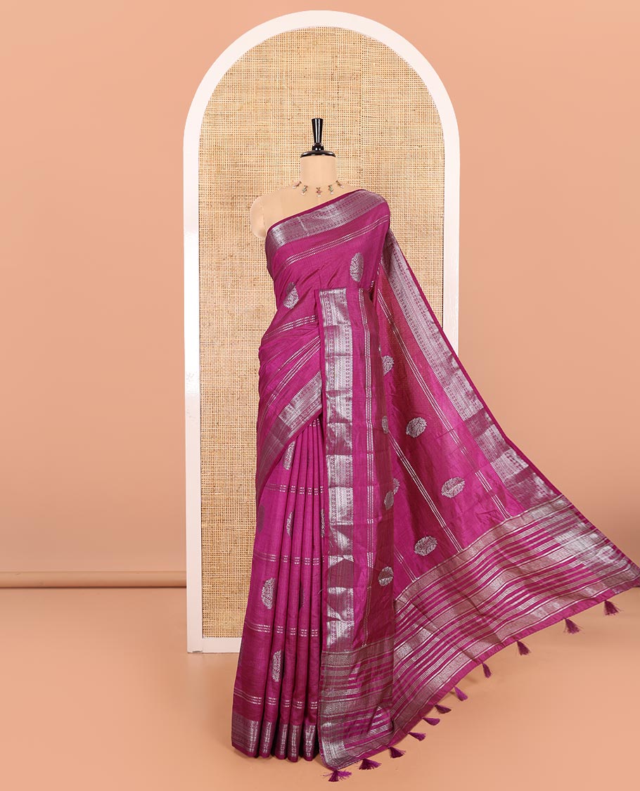 Violet Semi-Tussar Saree Adorned with Gold Zari Stripes and Elegant Paisley Zari Buttas, Featuring a Subtly Shimmering Pallu Adorned with Traditional Zari Designs, and Paired with a Matching Blouse