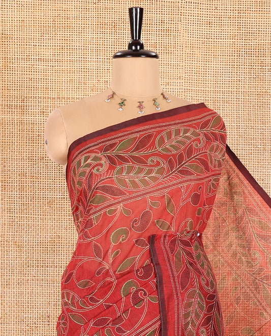 Red Khadi Cotton Saree Mesmerized with Kalamkari-Style Paisley-Floral Prints, Subtly Sparkled with Self-Border of Floral Creeper Designs, Complemented by Contrast Paisley-Floral Vine Pallu, and Paired with a Contrast Printed Blouse