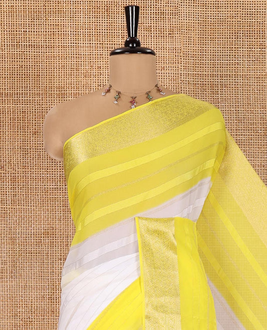 White and Yellow Georgette Saree, Subtly Sparkled with Horizontal Zari Stripes All Over Its Body, Complemented by a Contrast Traditional Zari Design Border, Gleaming Zari Striped Pallu, and Paired with a Contrast Blouse