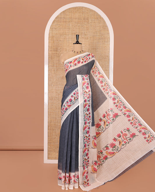Grey Linen Cotton Saree, Adorned with Checks All Over Its Body, Complemented by a Contrast Border of Floral and Bird Designs, Pallu Mirrors the Same Print, and Is Paired with a Contrast Floral Printed Blouse