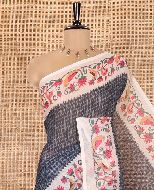 Grey Linen Cotton Saree, Adorned with Checks All Over Its Body, Complemented by a Contrast Border of Floral and Bird Designs, Pallu Mirrors the Same Print, and Is Paired with a Contrast Floral Printed Blouse