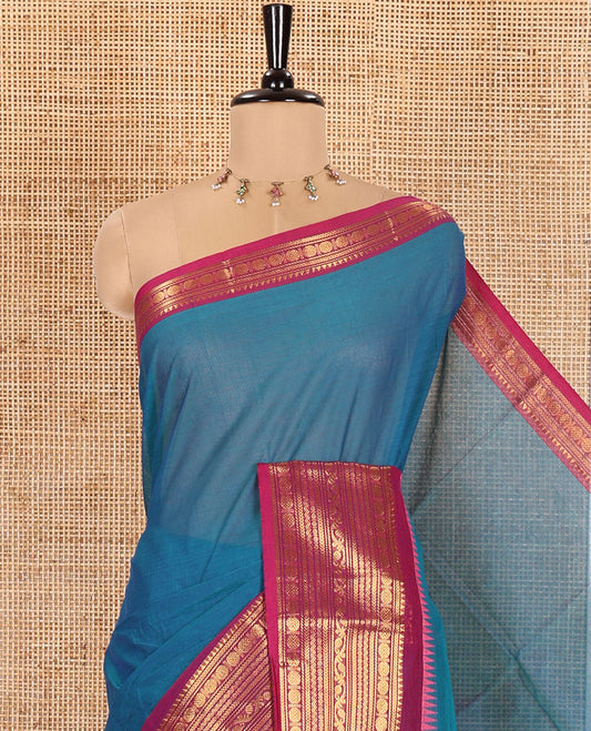 Blue Plain Chettinad Cotton Saree, Complemented by a Contrast Traditional Zari Design Woven Border of Rudraksham Designs, Subtly Striped Pallu, and Paired with a Matching Blouse