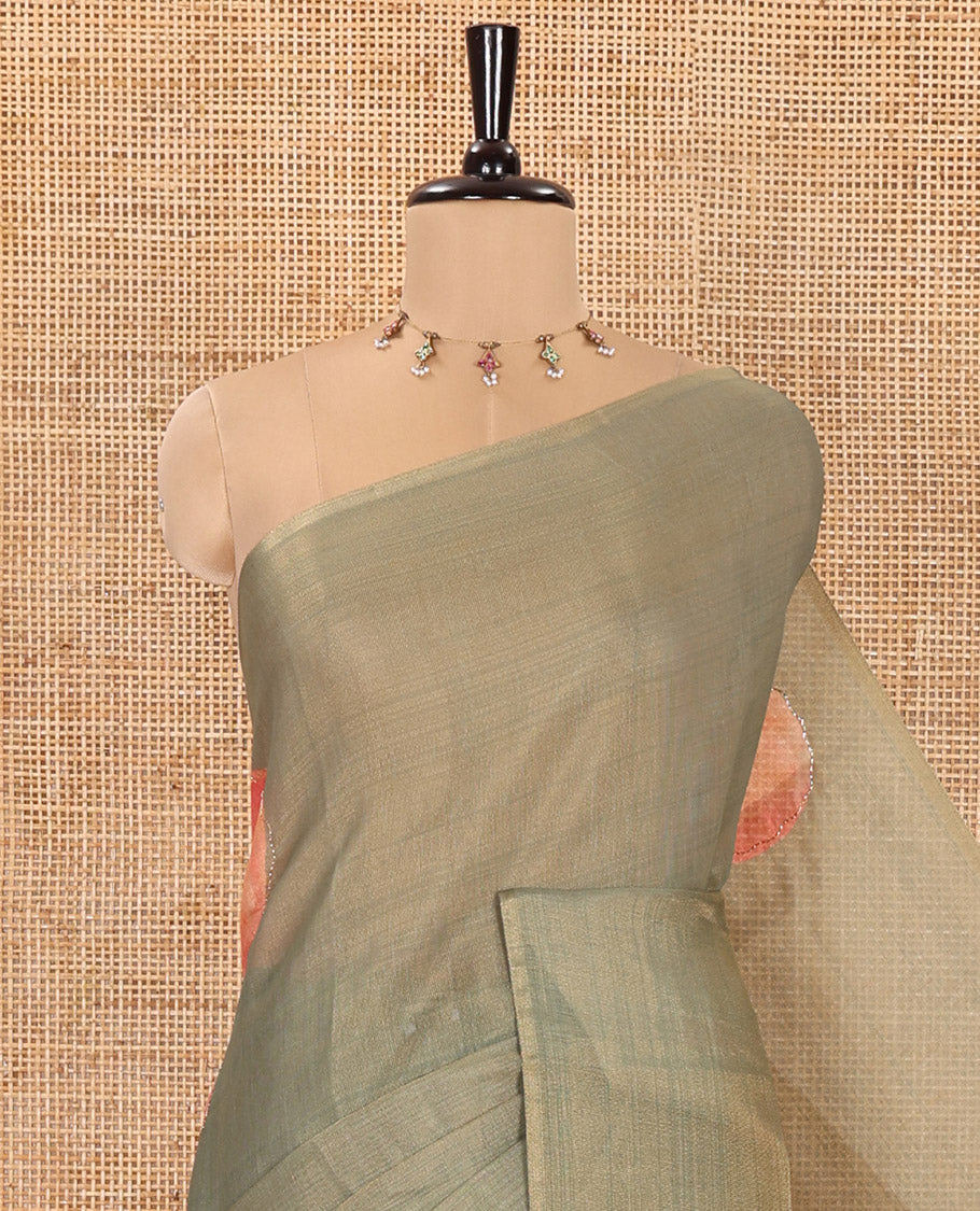 Borderless Green Tissue Saree, Elevated with Big Leaf Motifs Print, and Outline Embroidery All Over the Saree, Paired with a Subtle Leaf Motifs Printed Blouse