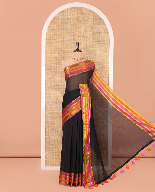 Black Plain Khadi Mul Cotton Saree, Complemented by Contrast Pink-Orange Zari Striped Border, Self-Pallu, and Paired with a Matching Blouse
