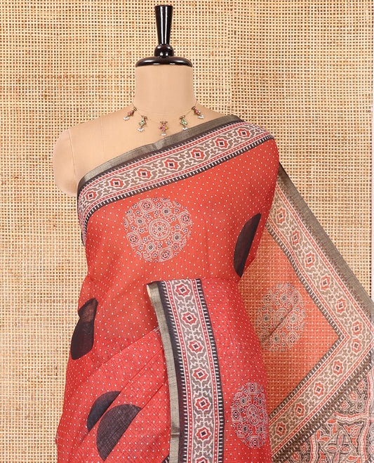 Red Linen Cotton Saree, Enthralled with Polka Dots and Ajrakh Polka Dot Printed on Its Body, Complemented by a Contrast Ajrakh Printed Border, Intricately Ajrakh Printed Pallu, and Paired with a Contrast Blouse