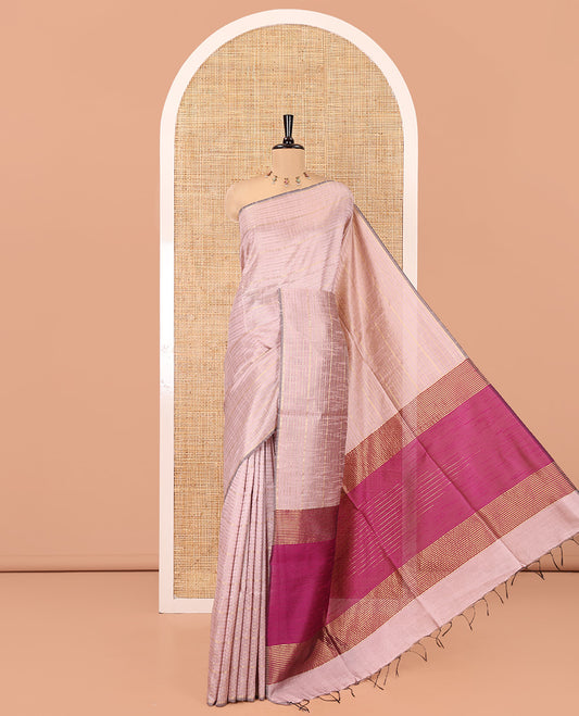 Borderless Pale Purple Semi-Raw Silk Saree, Ornamented with Muthu Stripes on Its Body, Complemented by a Contrast Zari Striped Pallu, and Paired with a Contrast Blouse