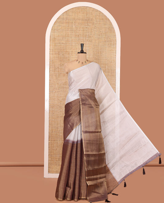 Borderless Brown Plain Tissue Saree, a Self-Pallu with Tassels, and a Matching Blouse