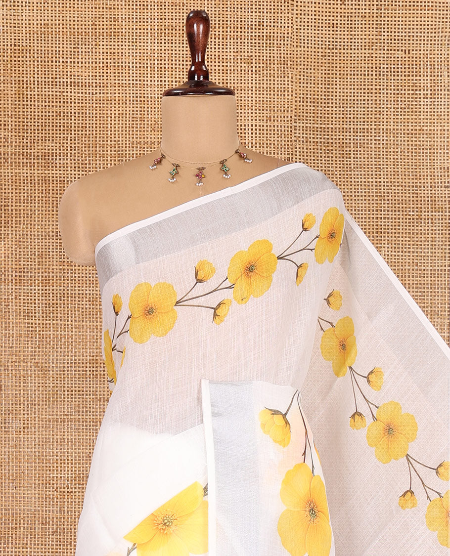 White-Yellow Linen Cotton Saree, Beautified with Floral Print, a Subtle Zari Border, and a Matching Blouse