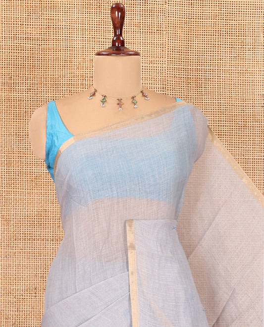 Borderless Grey Linen Cotton Saree Features Lotus Print, a Self-Pallu, and a Matching Blouse