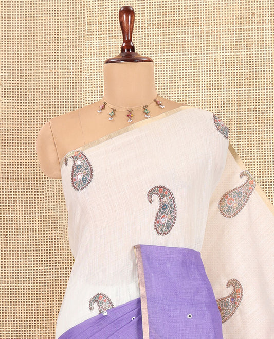 Cream-Purple Linen Cotton Saree Features Paisley Butta and Mirror Work, a Piping Border, a Self-Pallu, a Contrast Blouse