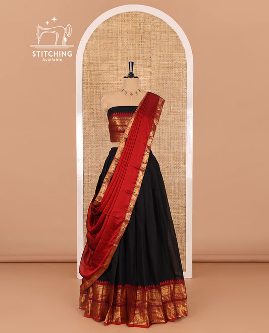 Black-red sungudi cotton half-saree, plain with contrast traditional zari varisai pettu bordered skirt, a matching blouse, and a zari bordered dhavani
