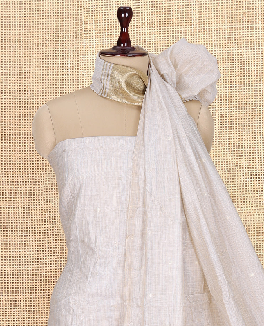 Cream Banarasi Chanderi Material Churidar Subtly Sparkled with Buttas Top, a Plain Bottom, and a Matching Dupatta