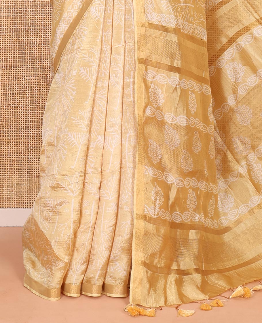 Gold tree motifs printed banana pith saree, zari piping border, floral printed pallu, and a matching printed blouse