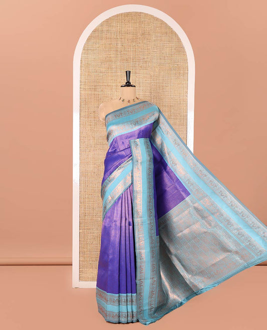 Blue Litchi Saree, Gleamed Up with Micro-Zari Checked Design on Its Body, Complemented by a Contrast Rettai Pettu Zari Design Border, Grandly Designed Pallu, and Paired with a Contrast Blouse