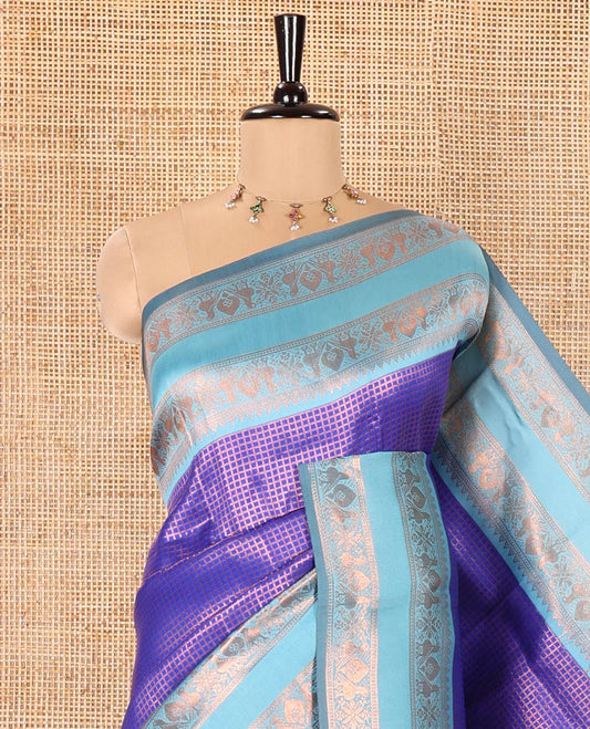Blue Litchi Saree, Gleamed Up with Micro-Zari Checked Design on Its Body, Complemented by a Contrast Rettai Pettu Zari Design Border, Grandly Designed Pallu, and Paired with a Contrast Blouse