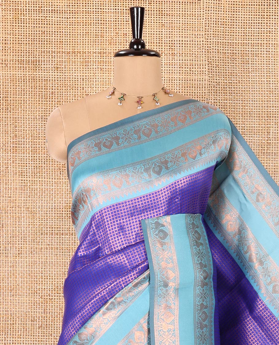 Blue Litchi Saree, Gleamed Up with Micro-Zari Checked Design on Its Body, Complemented by a Contrast Rettai Pettu Zari Design Border, Grandly Designed Pallu, and Paired with a Contrast Blouse