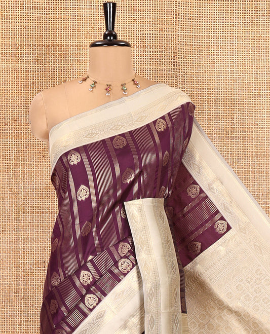 Wine Litchi Saree, Featuring Vaira Oosi Stripes and Zari Buttas on Its Body, Complemented by a Contrast Rettai Pettu Traditional Zari Design Border, an Intricately Designed Pallu, and Paired with a Contrast Blouse