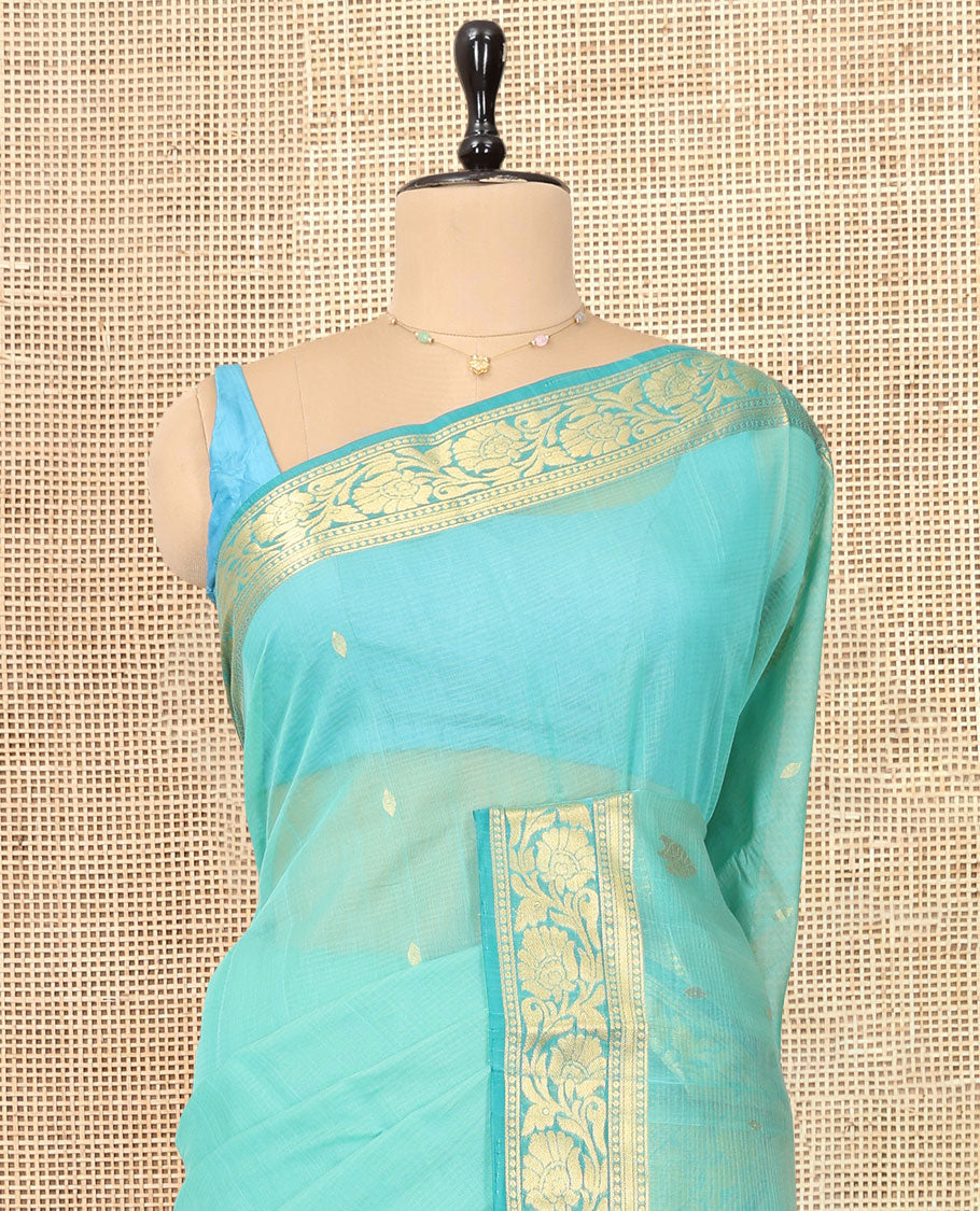 Turquoise Silk Cotton Saree, Sparsely Woven with Zari Buttas, Contrast Floral Creeper Border, Intricate Pallu, and a Contrast Blouse