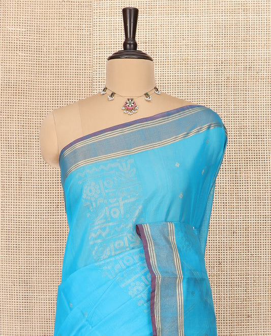 Blue Silk Cotton Saree Sparsely Sparkled with Zari Designs All Over the Body, Complemented by a Contrast Striped Border, Featuring a Contrast Pallu Steeped with Geometric Designs, and Paired with a Contrast Blouse