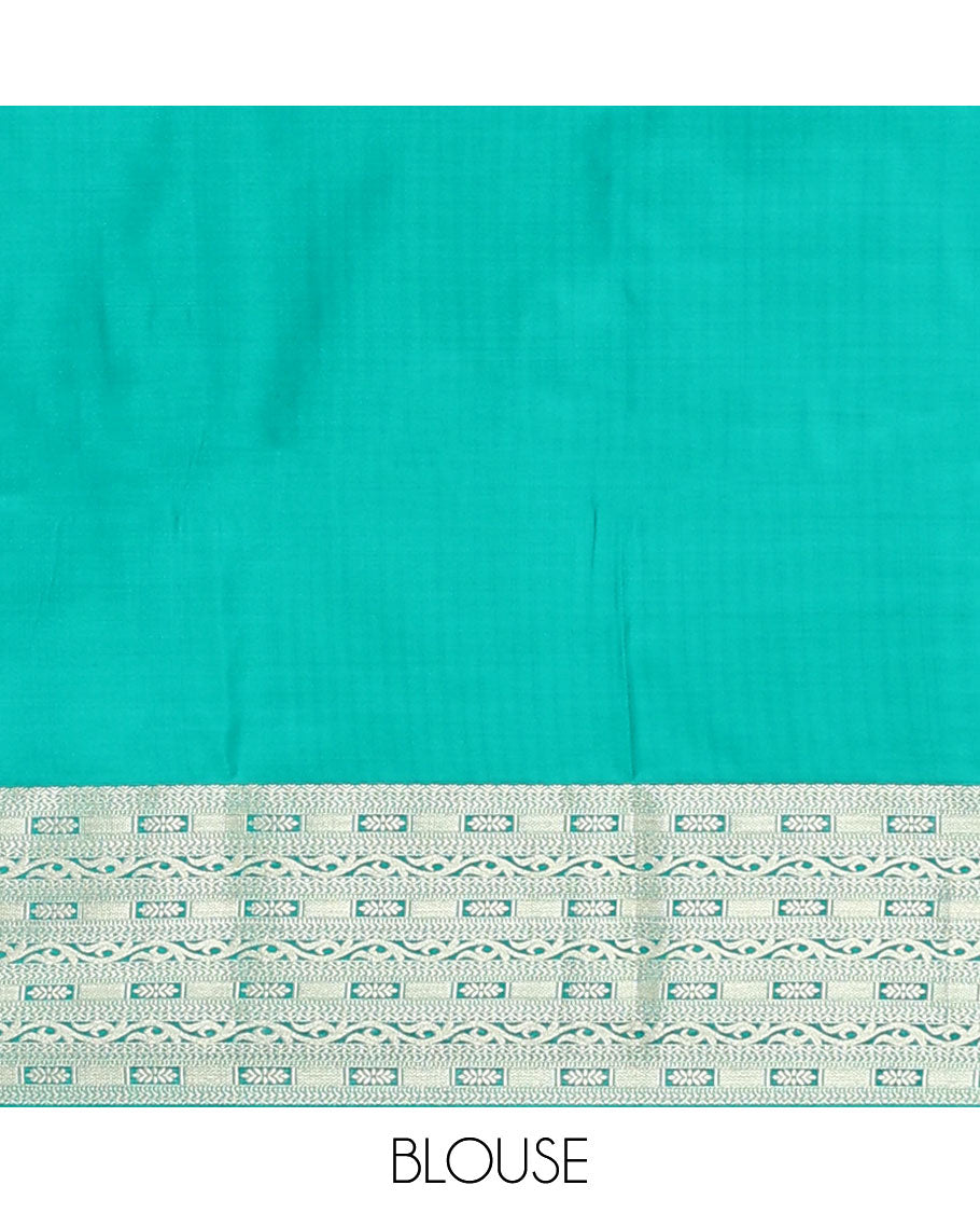 Green floral buttas soft silk saree, contrast traditional zari design border, and pallu of geometric patterns