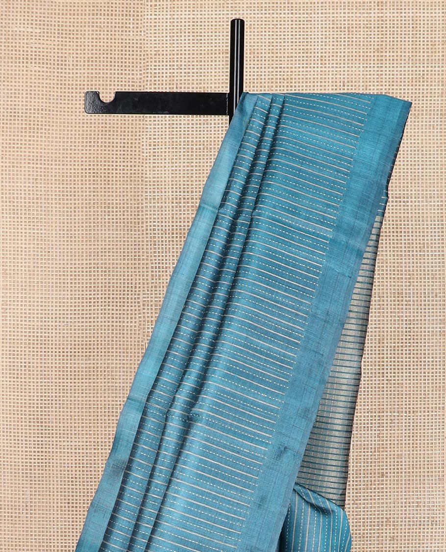 Peacock blue striped tussar silk saree, plain border and zari checked pallu