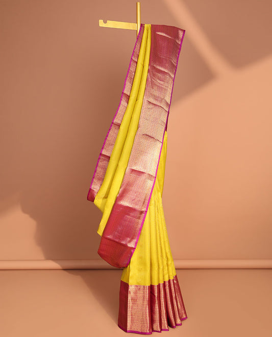 Yellow vasundhara elite silk saree with contrast intricate zari design border & zari jaal design pallu