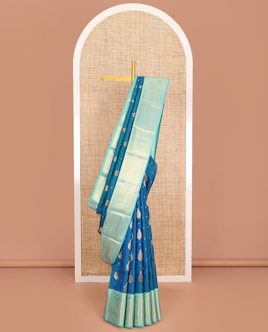 Blue Vasundhara Lite-Silk Mix Saree, Elevated with Zari Buttas, Highlighted by Contrast Border of Kodi Visiry and Rudraksham Designs, Pallu of Rudraksham Butta Enclosed Checks, and Paired with a Contrast Blouse