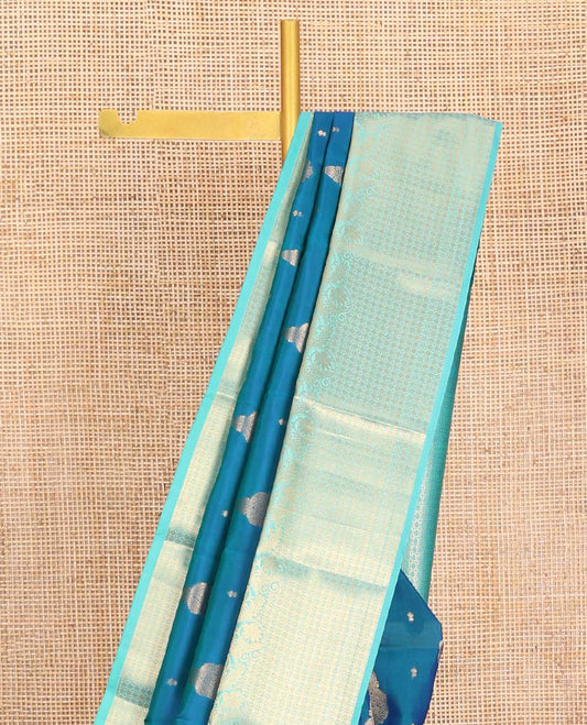 Blue Vasundhara Lite-Silk Mix Saree, Elevated with Zari Buttas, Highlighted by Contrast Border of Kodi Visiry and Rudraksham Designs, Pallu of Rudraksham Butta Enclosed Checks, and Paired with a Contrast Blouse