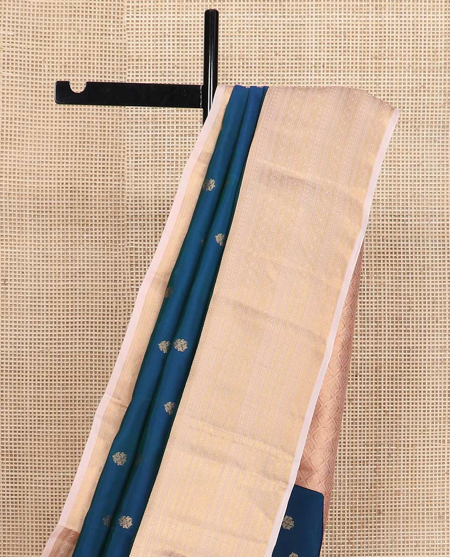 Blue zari buttas Vasundhara silk mix saree, contrast border of muthu, kathir, neli, rettai neli, rudraksham, and mayil designs, and jaal pallu