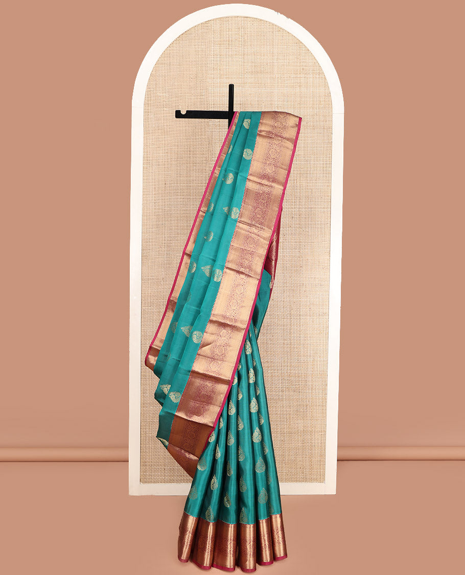Teal Vasundhara Lite Silk Mix Saree, Elegantly Highlighted with Zari Buttas, Complemented by a Contrast Border of Kodi Visiry Designs, Opulently Embellished Pallu, and Paired with a Contrast Blouse