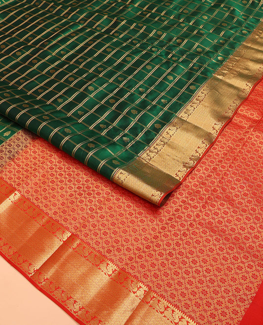 Green Vasundhara Lite Silk Mix Saree, Embellished with Zari Buttas on Its Body, Complemented by a Contrast Border of Traditional Designs, Grand Jaal Pallu, and Paired with a Contrast Blouse