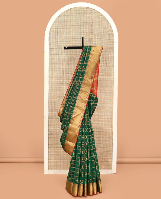 Green Vasundhara Lite Silk Mix Saree, Embellished with Zari Buttas on Its Body, Complemented by a Contrast Border of Traditional Designs, Grand Jaal Pallu, and Paired with a Contrast Blouse
