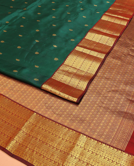 Green Vasundhara Lite Silk Mix Saree, Embellished with Zari Buttas on Its Body, Complemented by a Contrast Border of Traditional Designs, Grand Jaal Pallu, and Paired with a Contrast Blouse