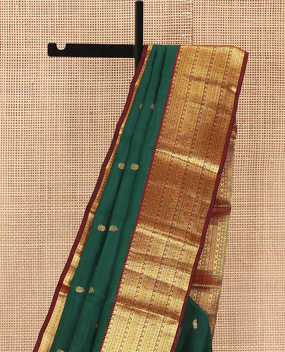 Green Vasundhara Lite Silk Mix Saree, Embellished with Zari Buttas on Its Body, Complemented by a Contrast Border of Traditional Designs, Grand Jaal Pallu, and Paired with a Contrast Blouse