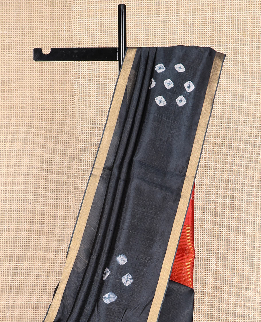 Black shibori printed banana pith saree, piping border, and contrast shibori print with zari stripes