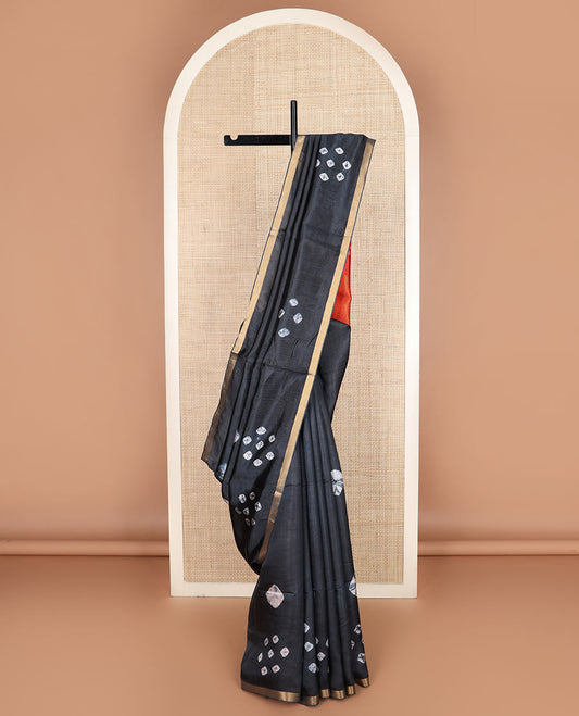 Black shibori printed banana pith saree, piping border, and contrast shibori print with zari stripes