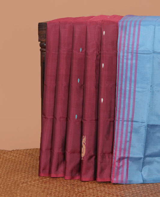 Borderless maroon buttas banana pith saree, contrast pallu of stripes, and buttas