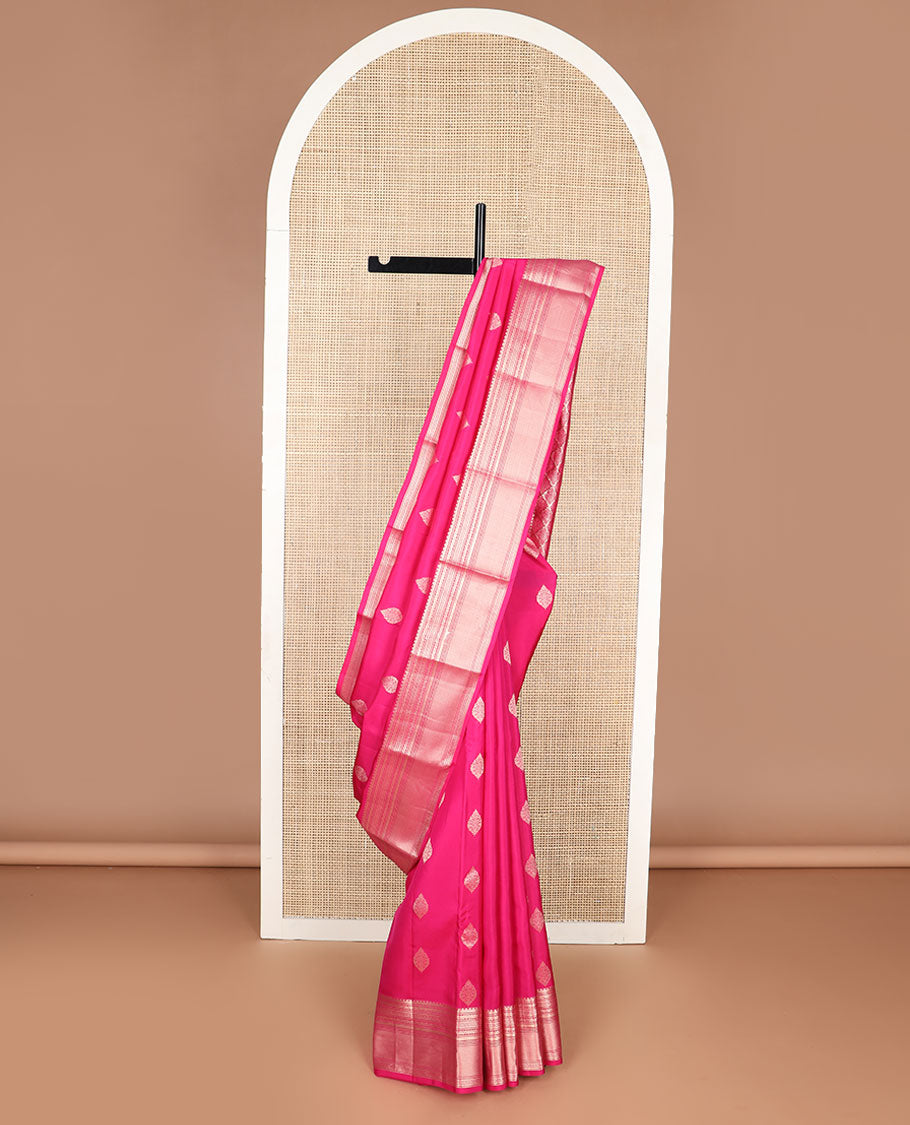 Pink buttas silk saree with self border of thilakam mokku, mayil kann , banaras design & zari design pallu