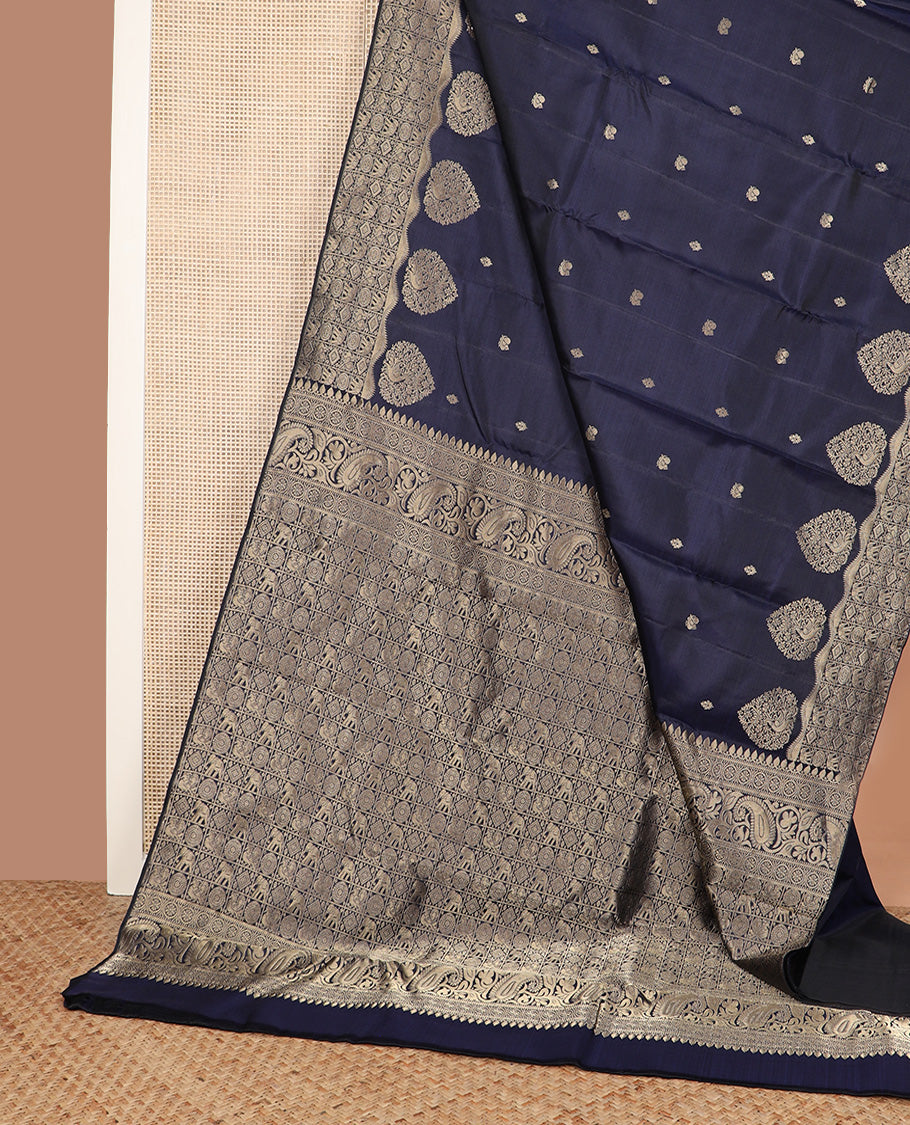 Navy blue zari buttas silk saree, zari border and pallu of zai yaanai, mayil, chakram, and diamond buttas enclosed checks