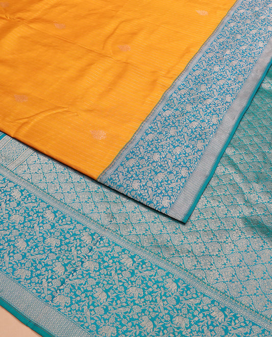 Yellow striped and zari buttas silk saree with contrast vanasingaram border of yaanai, killi, and kodi visiry designs, and jaal pallu